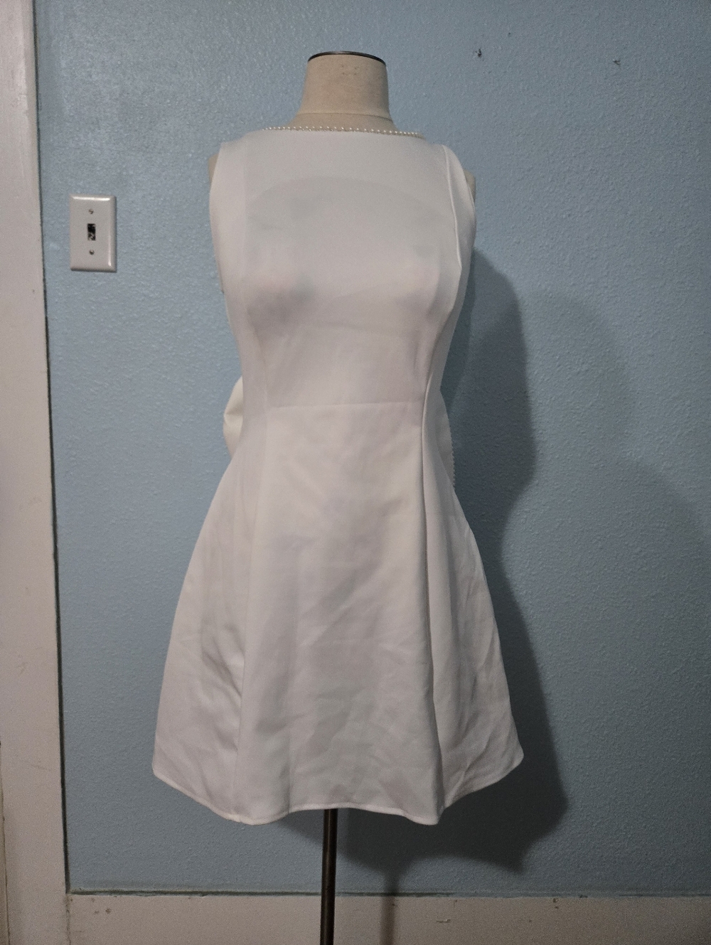 Sleeveless White A-Line Dress with Pearl Trim